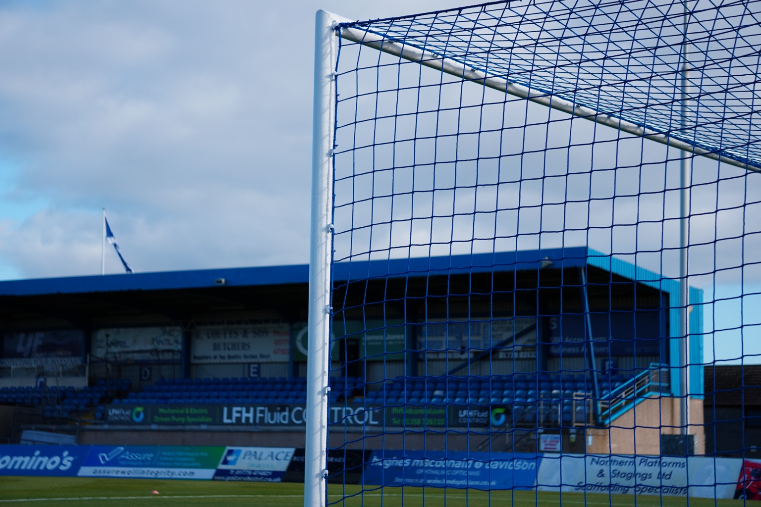 Goal net in front of the stand at Balmoral Stadium